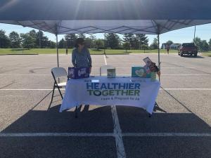 Kathy Federico helped work the Healthier Together table at the O'Fallon Recycle Days.